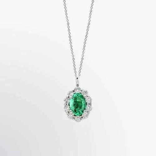 Viena: collar colgante de esmeraldas y diamantes .4.25ct esmeralda verde ovalada