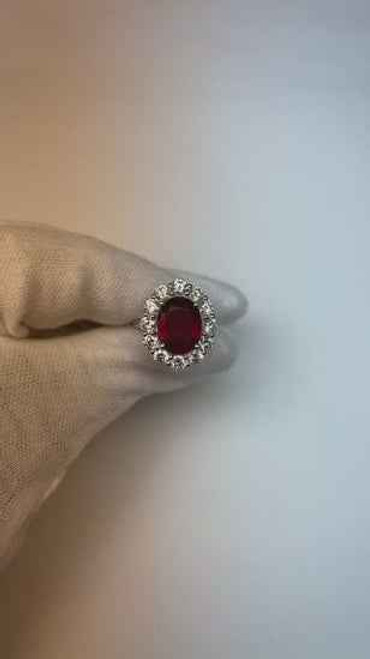 luxury ruby and diamond ring, natural 5 carat ruby ring, VS1 diamond halo ring, AAA clarity ruby jewelry, fine gemstone wedding ring, 14K white gold ruby ring, investment-grade ruby jewelry, oval-cut ruby engagement ring, bespoke gemstone bridal ring, collector’s ruby and diamond ring, high jewelry ruby statement piece, prestigious red ruby ring, sophisticated gemstone halo ring, heirloom-quality ruby and diamond ring, exclusive gemstone wedding jewelry