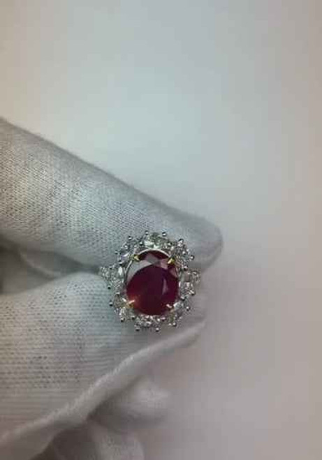 luxury ruby and diamond ring, natural oval ruby jewelry, 6.10 carat gemstone ring, fine ruby wedding ring, investment-grade ruby ring, bespoke ruby and diamond jewelry, high jewelry ruby ring, AAA clarity ruby, VS1 diamond accents, 14K gold ruby ring, white and yellow gold fine jewelry, collector's ruby ring, prestigious gemstone ring, sophisticated ruby bridal jewelry, rare earth-mined ruby