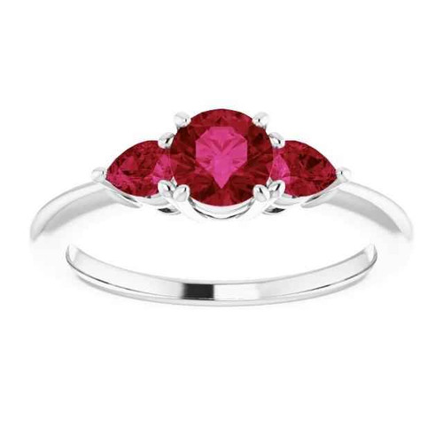 luxury ruby three-stone ring, AAA ruby gemstone jewelry, natural earth-mined ruby ring, fine ruby prong-set ring, 1.50 carat ruby statement ring, white gold 14K ruby jewelry, sophisticated gemstone ring, heirloom-quality ruby ring, pear and round ruby design, exquisite ruby cocktail ring, bespoke ruby fine jewelry, collector’s gemstone ring, high jewelry ruby setting, investment-grade ruby ring, timeless ruby engagement ring
