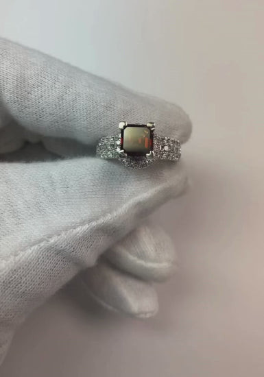 luxury ruby engagement ring, princess cut ruby ring, natural red ruby jewelry, AAA clarity ruby ring, VS1 diamond accents, 3 carat gemstone ring, 14K white gold ruby ring, fine ruby and diamond jewelry, heirloom ruby ring, bespoke engagement ring, collector’s gemstone jewelry, prestigious ruby diamond ring, investment grade ruby, sophisticated women’s jewelry, high jewelry ruby ring