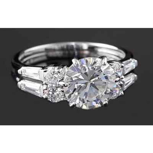 luxury anniversary diamond ring, 4.50 carat diamond ring, VS1 clarity diamond jewelry, F color diamond ring, round and baguette diamond design, statement diamond solitaire ring, natural earth-mined diamonds, high jewelry white gold ring, bespoke diamond anniversary band, collector's edition diamond ring, fine jewelry investment piece, 14K white gold luxury ring, prestigious diamond jewelry, sophisticated diamond engagement ring, heirloom-quality diamond ring