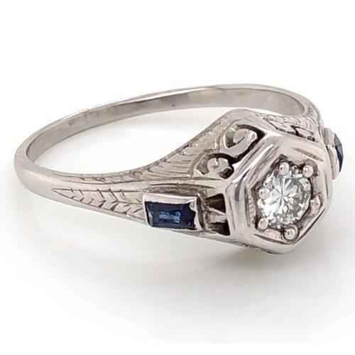 antique style diamond ring, Ceylon blue sapphire ring, 1.50 carat fine jewelry, VS1 diamond solitaire ring, F color diamond jewelry, AAA quality sapphire ring, white gold 14K luxury ring, natural earth-mined sapphire, baguette cut sapphire accents, brilliant round diamond ring, high jewelry sapphire ring, collector's diamond and sapphire ring, bespoke gemstone engagement ring, timeless sapphire and diamond jewelry, investment grade gemstone ring