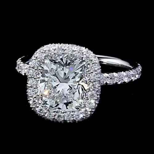 luxury halo diamond ring, 3 carat diamond engagement ring, cushion cut diamond ring, VS1 clarity diamond jewelry, F color diamond engagement ring, bespoke white gold ring, high jewelry engagement ring, natural earth-mined diamonds, fine diamond halo ring, 14K white gold diamond ring, collector’s diamond ring, investment-grade diamond jewelry, cushion and round cut diamond, prestigious engagement ring, certified diamond jewelry, exclusive bridal jewelry, heirloom-quality diamond ring, sophisticated diamond halo ring, couture engagement jewelry, exceptional craftsmanship ring