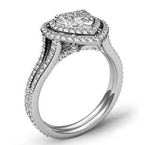 natural heart-shaped diamond ring, double halo diamond ring, bespoke diamond engagement ring, 6.55 carat diamond ring, VS1 clarity heart diamond, VVS1 accent diamonds, G color diamond jewelry, high jewelry halo ring, investment-grade diamond ring, custom white gold ring, 14K white gold fine jewelry, luxury diamond statement ring, exclusive heart-cut diamond, collector's diamond halo ring, superior craftsmanship fine jewelry, prestigious diamond engagement ring, bespoke high jewelry creation, rare heart-shaped diamond, sophisticated diamond halo ring