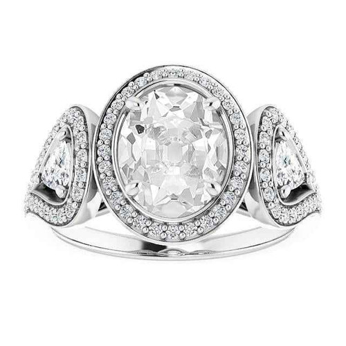 Victoria: Exquisite Halo Diamond Ring .10.50ct Trillion & Oval Cut Diamonds