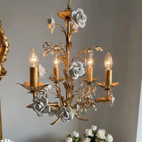 Edwina chandelier, whimsical chandelier, Bridgerton-inspired lighting, fairycore decor, cottagecore light fixture, floral chandelier, porcelain flower light, romantic home decor, vintage pastel lighting, statement ceiling light, shabby chic chandelier, romantic interior design, aesthetic room decor, fairytale lighting, antique gold chandelier, ceramic flower light, pastel aesthetic, vintage home accents, fairytale bedroom decor, whimsical lighting