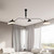 Mid-century ceiling light installed in a modern living space, providing wide ambient and directional illumination.