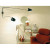 Industrial adjustable wall sconce showing two extended arms for flexible directional lighting in modern interiors.