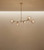 botanical lighting design, modern organic style, wabi-sabi lighting, imperfect beauty decor, wabi-sabi interior accent, minimalist organic design, earthy tones decor, neutral interior lighting, warm beige backdrop style, natural stone room complement, textured wall harmony, raw wood accent pairing, organic minimalism, wabi-sabi aesthetic, serene interior lighting, peaceful living space decor, mindful design fixture, subtle elegance chandelier, understated luxury light, timeless design chandelier, classic modern fusion, trendsetting lighting design, popular interior trends, architectural digest style, interior design staple, home renovation lighting, interior styling element, luxury real estate staging, high-end interior project, boutique hotel lighting, modern apartment decor,