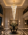 Clarissa 300cm Crystal Hotel Lobby Chandelier – Luxury High Ceiling Statement Lighting
The Clarissa 300cm clear crystal spiral chandelier shown within a grand luxury hotel lobby, where its long cascading form creates an elegant focal point beneath a high ceiling. The gold frame and illuminated crystal prisms complement marble flooring, classical wall detailing and refined hospitality interiors.