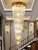 Giovani Luxurious Long Staircase Chandelier in Gold with Clear Crystals - Perfect for Hotel Lobbies, Ballrooms, and Event Spaces