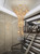 bright silver metal, frosted silver tone, ice silver aesthetic, metallic texture, artisan metal finish, hand-forged branch style, organic metal framing, structural branch design, nature-inspired metallic art, botanical branch silhouette, custom metal sculpture, durable steel framework, high-durability alloy, corrosion-resistant lighting, luxury metal craftsmanship, premium finishing technique, detailed branch texturing, multi-branch composition, layered metallic structure, vertical metallic drop, grand scale metalwork, refined metallic sheen, crystal drop accents,