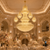 Lavinia Gold Crystal Wedding Venue Chandelier in Grand Luxury Ballroom
A spectacular wedding ballroom featuring the Lavinia Imperial Palace chandelier as the centrepiece above an opulent reception setting. Surrounded by floral displays, candlelight and refined classical architecture, this large gold crystal chandelier is perfectly suited to luxury wedding venues, destination resorts, grand reception halls and palace-style event interiors.