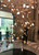 The Oro Luxurious Hotel Lobby Gold Contemporary Large Chandelier is a magnificent lighting fixture that exudes grandeur and elegance. With its gold finish and contemporary design, it adds a touch of opulence to any space. The chandelier features multiple gold metal arms branching off in unique directions, creating a captivating visual display. This large-scale chandelier is perfect for commercial atriums and hotel lobbies, commanding attention and becoming a stunning centerpiece. Illuminate your space with the Oro Luxurious Chandelier and experience the luxurious ambiance it creates, making a lasting impression on all who behold it.