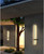 A beautiful modern outdoor wall lamp in black is a stylish and sophisticated lighting fixture that adds a touch of elegance to any outdoor space. With its sleek and minimalist design, this type of wall lamp is perfect for illuminating outdoor living areas, walkways, and outdoor landscapes.

Crafted from durable and weather-resistant materials, this type of wall lamp is designed to withstand the elements and maintain its beautiful appearance for years to come. The use of energy-efficient LED technology provides bright and clear illumination, while consuming less energy than traditional lighting sources.

The black color of this type of outdoor wall lamp creates a chic and modern look that complements any outdoor décor. It is perfect for creating a dramatic effect on patios, decks, and outdoor living areas. The soft and subtle illumination also enhances the beauty of outdoor landscapes, making it an ideal addition to any garden or yard. Whether used for practical or aesthetic purposes, a beautiful modern outdoor wall lamp in black is a must-have for any outdoor space.