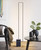 modern minimalist floor lamp Introducing our modern minimalist floor lamp, a perfect combination of contemporary design and functional simplicity. With its sleek lines and minimalist aesthetic, this floor lamp effortlessly elevates the style of any space. The clean and uncluttered design makes it a versatile choice for various interior decors, from modern to Scandinavian. Its slim profile and compact footprint make it an ideal lighting solution even for smaller rooms. The adjustable brightness and direction allow you to create the desired atmosphere and task lighting, making it perfect for reading, working, or adding a warm glow to your living space. Embrace modern elegance with our minimalist floor lamp.