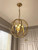 Sila: Round Gold Chandelier - Gold Candle Chandelier - Retro Chandelier Lights