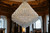 Indulge in the pinnacle of opulence with our luxury hotel chandeliers, meticulously crafted for immense lobbies and soaring high ceilings. Each fixture is a masterpiece of sophistication, seamlessly blending grandeur with contemporary allure. Adorned with exquisite crystals, these chandeliers cast an enchanting glow, creating an ambiance of unmatched elegance. Designed to captivate and impress, our chandeliers redefine luxury lighting for grand hotel spaces, setting a tone of refinement and allure. Elevate your hotel's aesthetic with these statement pieces, where each detail reflects unparalleled craftsmanship and timeless design, ensuring an unforgettable and luxurious atmosphere for discerning guests.