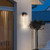 Elevate your outdoor ambiance with Ari's sleek black modern external wall lighting. Crafted with sophistication, these fixtures boast contemporary design elements that blend seamlessly with any exterior decor. The addition of glass in our outdoor wall lights provides a touch of elegance, diffusing light beautifully while illuminating your outdoor spaces. Perfect for enhancing curb appeal or adding a modern touch to outdoor living areas, our glass outdoor wall lights offer both style and functionality. Illuminate your outdoor space with Ari's black modern external wall lighting and enjoy the perfect blend of aesthetics and practicality.