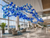 Naola Blue Glass Chandelier in Luxury Cruise Terminal Atrium
A spectacular view of the Naola cobalt blue glass chandelier suspended within a premium cruise terminal or ferry lounge atrium. The flowing arrangement of luminous blue glass spheres complements the expansive glazed architecture and coastal setting, making it ideal for high-end transport hubs, waterfront terminals and large contemporary public interiors.