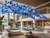Naola Cobalt Blue Glass Chandelier in Luxury Spa Resort Atrium
A calming and elegant image of the Naola glass ball chandelier installed above a serene wellness resort atrium. The blue-toned glass spheres echo the water-led interior palette, creating a luxurious atmosphere ideal for spa resorts, wellness hotels, thermal retreats and other sophisticated high-ceiling hospitality environments.