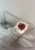 luxury ruby diamond ring, 12 carat heart-shaped ruby, VS1 diamond accents, AAA clarity ruby jewelry, fine gemstone ring, high jewelry ruby ring, natural earth-mined ruby, investment-grade ruby ring, bespoke ruby and diamond ring, collector's gemstone jewelry, prestigious red ruby ring, 14K white gold statement ring, exquisite heart-shaped ruby, certified fine jewelry, sophisticated ruby diamond design, elite gemstone ring, handcrafted ruby solitaire, rare gemstone collector’s piece, heirloom-quality ruby ring