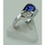 luxury tanzanite diamond ring, pear shape tanzanite jewelry, AAA tanzanite gemstone ring, VS1 diamond accent ring, 14K white gold fine jewelry, natural earth-mined tanzanite, collector's gemstone ring, high jewelry tanzanite ring, bespoke fine jewelry, investment grade gemstone, certified tanzanite diamond ring, sophisticated gemstone jewelry, infinity design luxury ring, exclusive tanzanite engagement ring, heirloom quality tanzanite ring