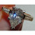 Diana: Exquisite Three .Stone Ring With Pear Diamond