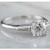 Anillo de diamantes de tres piedras de lujo, anillo de diamante de 1.50 quilates, anillo de diamantes F de color V1, diamantes de baguette cónicos vvs1, anillo de oro blanco de joyas finas, anillo de diamantes de oro blanco de 14k, anillo de diamantes de diamantes de grado de inversión, anillo de diamantes de diamantes con mínimo de tierra natural, anillo de compromiso de tres puntos, anillo de jóvenes de joyería, anillo de oro de joyería, un anillo de patio de joyas de diamante de diamante, un anillo de oro de diamante de diamantes elegante, un anillo de oro de joyería, un anillo de oro de joyería, un anillo de oro coleccionable, un anillo de oro de diamante de diamantes elegante, un anillo de oro, un anillo de oro de joyería, un anillo de oro de diamantes elegante, un anillo de oro, un anillo de oro de diamante elegante, un anillo de oro, un anillo de oro de joyería elegante. Diamante sofisticado, anillo de diamantes de calidad de reliquia