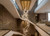 double-height atrium, luxury hotel lobby, modern penthouse interior, grand staircase installation, high-end residential space, minimalist luxury architecture, marble interiors, floor-to-ceiling windows, open-plan luxury living room, contemporary villa design