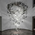 Linear statement chandelier

Modern glass shard pendant lighting

Sculptural glass chandelier

Luxury rectangular light fixture

Bespoke architectural lighting

Hand-crafted glass art chandelier