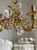 classic luxury home accents, vintage gold lamp, elegant floral fixture, traditional European lighting, luxurious ceiling decoration, graceful scrolled chandelier, antique finish lighting, sophisticated vintage decor, chic floral chandelier, upscale historic lighting, classic Regency chandelier