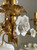 luxury architectural lighting, elegant traditional decor, vintage floral accent light, grand foyer chandelier, romantic interior design, luxury country style lighting, antique style ceiling lamp, decorative gold chandelier, classic porcelain lighting, timeless vintage decor, ornate floral hanging lamp, high-end Regency fixture, elegant living room lighting, luxury period lighting,