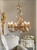 Posy chandelier, Bridgerton inspired chandelier, gold regency style lighting, vintage interior chandelier, floral porcelain chandelier, antique gold ceiling light, rococo style hanging lamp, romantic bedroom lighting, luxury vintage home decor, French provincial chandelier, 63cm gold chandelier, porcelain rose lighting, English country estate decor, grand ballroom lamp