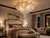 Celestine Tassel Chain Chandelier in Elegant Hollywood Regency Bedroom
The Celestine gold and silver flush mount chandelier styled above an opulent bedroom with upholstered furnishings, polished metallic accents and refined neutral tones, creating a glamorous Hollywood Regency statement without the long drop of a traditional chandelier.