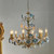 Hyacinth chandelier, Bridgerton-blue inspired chandelier, luxury floral ceiling light, vintage floral chandelier, blue and gold rose chandelier, ceramic flower chandelier, regency style lighting, romantic dining room light, statement ceiling fixture, antique gold vine lamp, French country chandelier, cottagecore ceiling light, pastoral home decor, shabby chic lighting, botanical chandelier, handmade ceramic rose light, elegant hanging lamp, classic gold fixture,