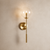 Warm Brass Globe Wall Sconce
Valeria: Brass Globe Wall Light – Mid-Century Modernist Glass Wall Sconce for Luxury Interiors