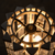 Vesper Glam Rock Floor Lamp – Crystal Prism & Brass Top Detail
Detailed top view of the Vesper crystal floor lamp showing its circular aged brass structure, faceted crystal prisms and warm glowing E14 lights. A refined product close-up that showcases the rich materials, sculptural geometry and dark glamour aesthetic of this luxury statement floor lamp.