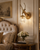 Scotland Gold Stag Wall Light in a Luxury Panelled Bedroom
The Scotland stag wall light styled beside an elegant upholstered bed in a richly detailed bedroom with classical wall panelling, polished dark wood furniture and soft neutral textiles. The gold deer head and crystal drops create a warm statement feature with a refined country-house feel.