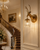 Scotland Stag Crystal Wall Sconce in a Grand Staircase Hall
The Scotland gold stag wall light displayed in an opulent entrance hall with sweeping staircase, decorative mouldings and traditional architectural detailing. Its sculptural antlers and illuminated crystal shade bring warmth and character to a grand transitional space.