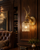 Scotland Deer Head Crystal Wall Sconce in a Luxury Wood-Panelled Interior
A closer three-quarter view of the Scotland stag wall sconce mounted on polished dark wood panelling, surrounded by classic furniture and refined architectural detailing. The warm gold finish and illuminated crystal prisms stand out beautifully against the darker, more traditional setting.