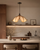 Lunara Petal Pendant Light in a High-End Japandi Kitchen
The Lunara flower pendant light featured above a luxurious kitchen island with warm walnut cabinetry, pale stone surfaces and softly illuminated shelving. Its organic petal silhouette adds warmth and sculptural character to the minimalist interior.