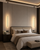Arlo Luxury Linear Pendant Lights in a Panelled Master Bedroom
A matching pair of Arlo black linear pendant lights framing a luxury upholstered bed with elegant wall panelling and layered neutral bedding. The slim vertical design creates a refined hotel-style symmetry while the warm glow adds depth and atmosphere.