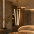 Veyra Gold Geometric Pendant Light in a Luxury Living Room
The Veyra gold LED pendant light displayed in a warm, contemporary living room with curved seating, stone finishes and ambient architectural lighting. Its sculptural geometric silhouette and slim integrated LED elements create a refined designer look for luxury living rooms, hotels, lounges and premium commercial interiors.