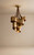 Cersci chandelier, organic ribbon chandelier, modern brass pendant light, multi-tiered brass light, designer ceiling fixture, luxury kitchen lighting, 90x65cm chandelier, brushed brass statement light, contemporary organic lighting, luxury dining room chandelier, upscale interior lighting, high-end cafe lighting, architectural metal chandelier, swirling brass ribbon light, custom designer lighting fixture, statement ceiling light, modern luxury decor