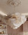 Nira chandelier, fabric petal chandelier, wabi-sabi ceiling light, organic fabric pendant, luxury tiered chandelier, off-white textile lamp, modern organic lighting, designer fabric light fixture, 80cm statement chandelier, high-end hospitality lighting, bespoke interior design lamp, upscale residential ceiling light, contemporary minimalist fabric lamp, luxury villa hanging fixture, architectural textile lighting, Wabi-sabi pendant lamp, organic textile chandelier, layered fabric ceiling light, soft diffused ambient lamp, modern minimalist fabric fixture, luxury dining room chandelier, high ceiling fabric pendant, boutique hotel hanging lamp, upscale restaurant lighting, artisan textile chandelier, designer organic light source
