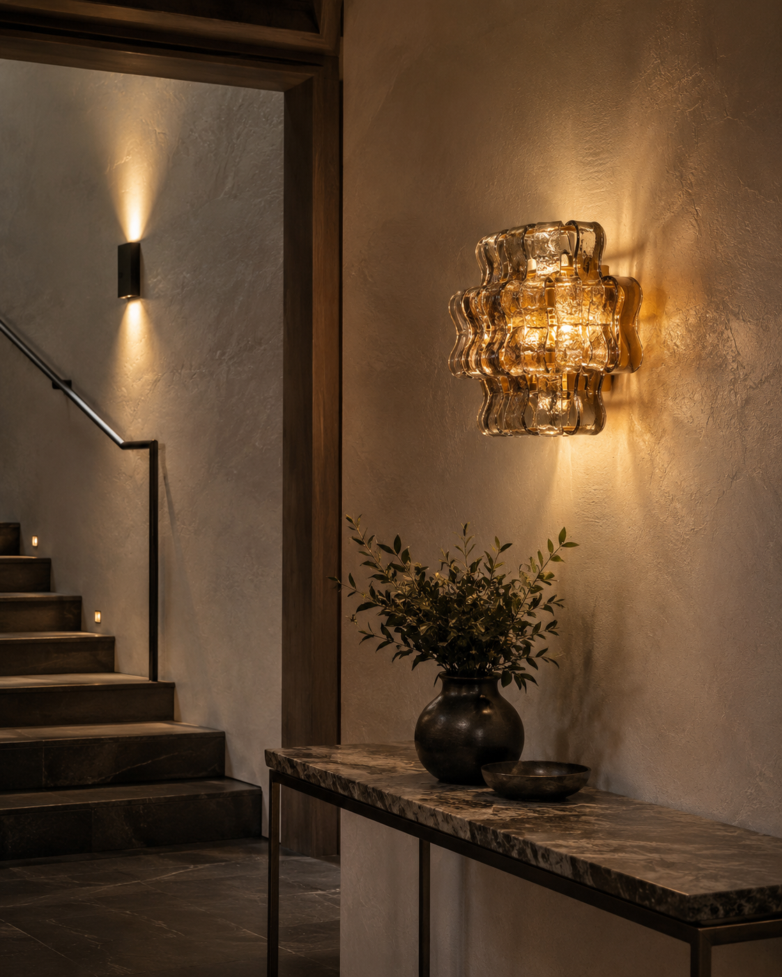 orlena-smoked-glass-wall-sconce-in-a-high-end-hallway.png