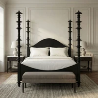 Hand-rubbed black mahogany four-poster bed with carved details and white bedding in a classic bedroom.