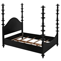 Black mahogany four-poster bed with hand-carved, turned posts and a curved headboard.